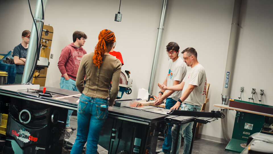 Student techs participate in woodshop safety training.